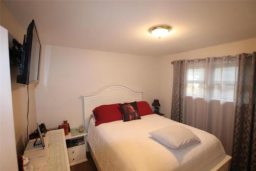 240 Ross Avenue, The Pas, MB - Indoor Photo Showing Bedroom