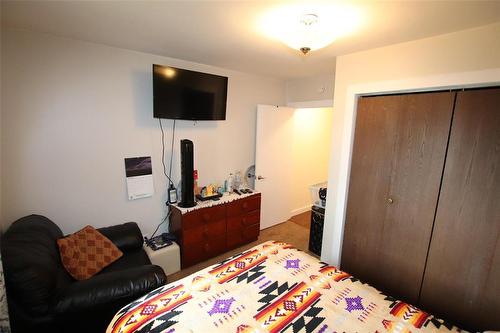 240 Ross Avenue, The Pas, MB - Indoor Photo Showing Bedroom