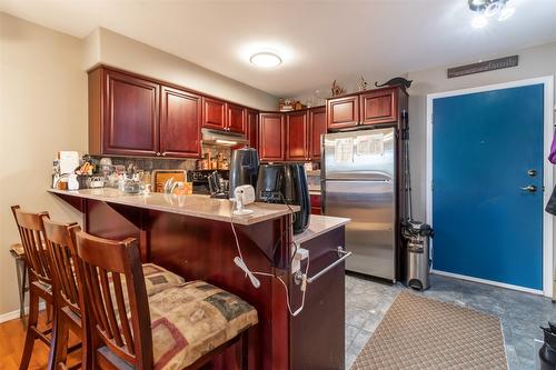 205-2425 Mount Baldy Drive, Kelowna, BC - Indoor Photo Showing Kitchen With Stainless Steel Kitchen