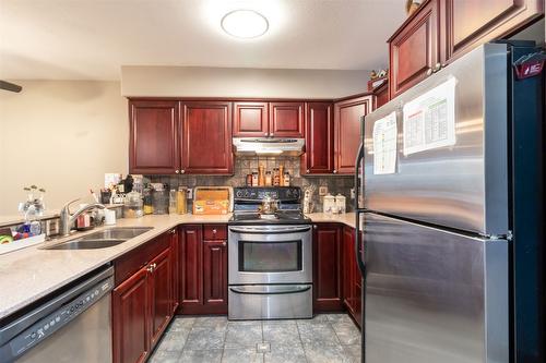 205-2425 Mount Baldy Drive, Kelowna, BC - Indoor Photo Showing Kitchen With Stainless Steel Kitchen With Double Sink