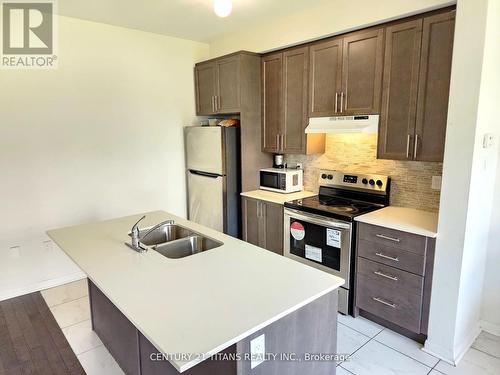 2553 Winter Words Drive, Oshawa (Windfields), ON - Indoor Photo Showing Kitchen With Stainless Steel Kitchen With Double Sink