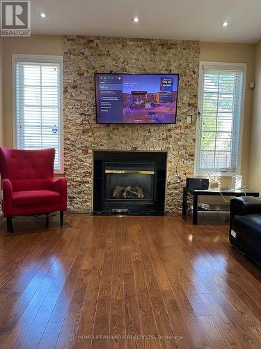 20 Latania Boulevard, Brampton, ON - Indoor Photo Showing Living Room With Fireplace