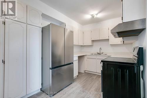 403 - 130 Neptune Drive, Toronto (Englemount-Lawrence), ON - Indoor Photo Showing Kitchen With Double Sink