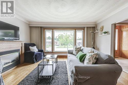 65 Allonsius Drive, Toronto, ON - Indoor Photo Showing Living Room With Fireplace