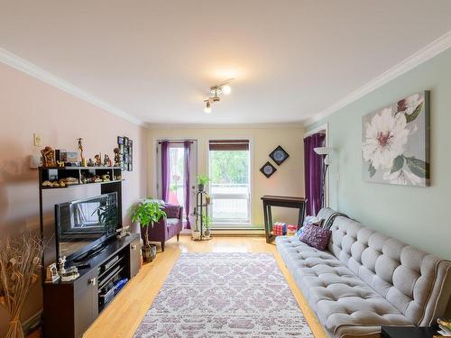 Living room - 302-6680 Rue De Terrebonne, Montréal (Côte-Des-Neiges/Notre-Dame-De-Grâce), QC - Indoor Photo Showing Other Room With Fireplace