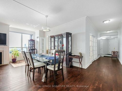 2808-25 Kingsbridge Garden Circ, Mississauga, ON - Indoor Photo Showing Dining Room With Fireplace