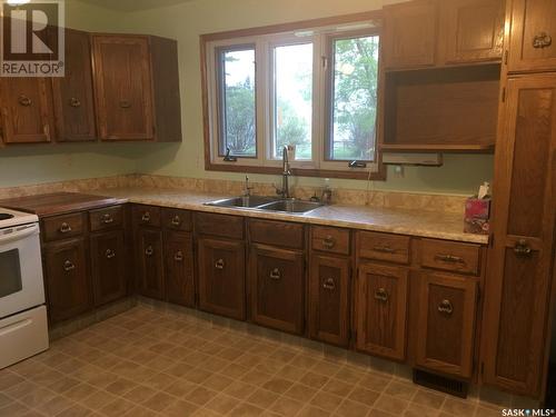 836 Peters Avenue, Oxbow, SK - Indoor Photo Showing Kitchen With Double Sink