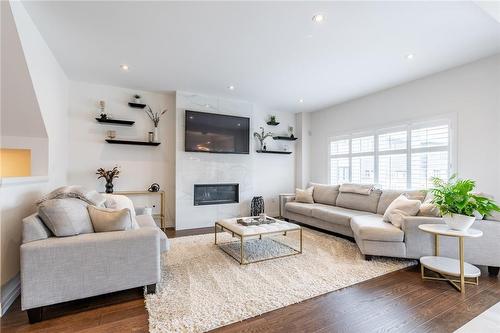 28 Columbus Gate, Stoney Creek, ON - Indoor Photo Showing Living Room With Fireplace