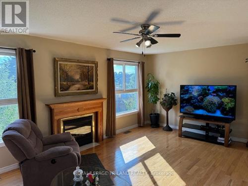 75 Loggers Grove, London, ON - Indoor Photo Showing Living Room With Fireplace