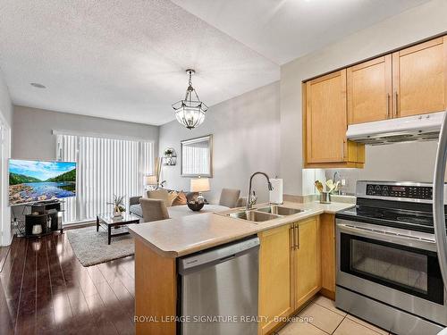 306-1121 Bay St, Toronto, ON - Indoor Photo Showing Kitchen With Double Sink