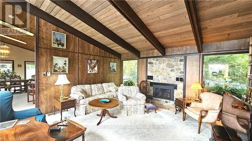 100 Whippoorwill Road, Northern Bruce Peninsula, ON - Indoor Photo Showing Living Room With Fireplace