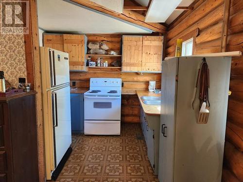 135 Dalton Street, Haines Junction, YT - Indoor Photo Showing Kitchen With Double Sink