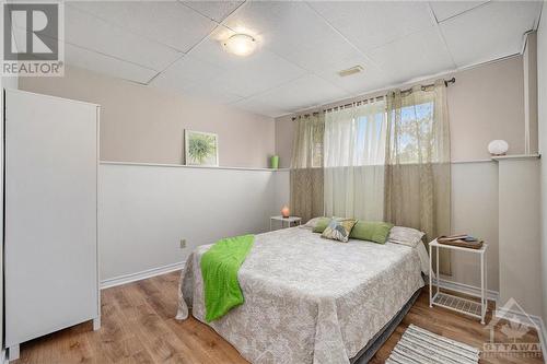 lower level bedroom with new luxury vinyl flooring - 1657 7Th Line Road, Carleton Place, ON - Indoor Photo Showing Bedroom