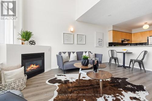 534 - 200 Manitoba Street, Toronto (Mimico), ON - Indoor Photo Showing Living Room With Fireplace