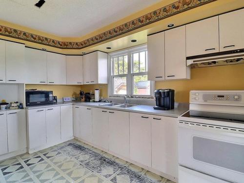 Kitchen - 708 Av. Dallaire, Rouyn-Noranda, QC - Indoor Photo Showing Kitchen With Double Sink