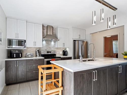 Kitchen - 1810 51E Avenue (P.-A.-T.), Montréal (Rivière-Des-Prairies/Pointe-Aux-Trembles), QC - Indoor Photo Showing Kitchen With Upgraded Kitchen