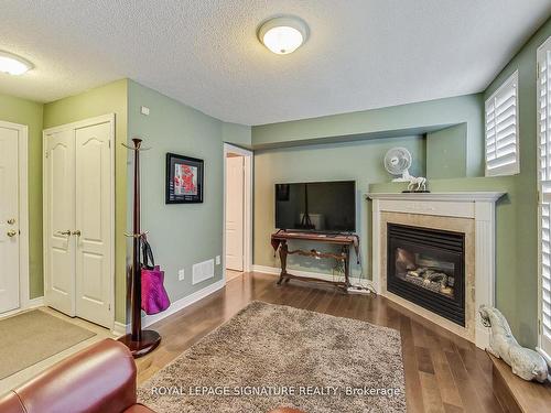 49 San Remo Terr, Toronto, ON - Indoor Photo Showing Living Room With Fireplace