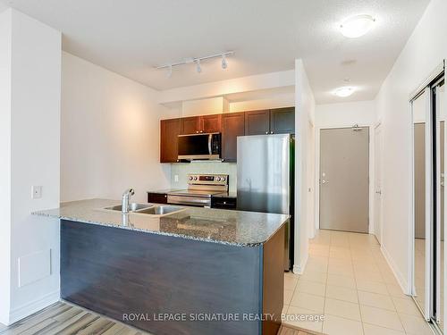 217-3525 Kariya Dr, Mississauga, ON - Indoor Photo Showing Kitchen With Double Sink