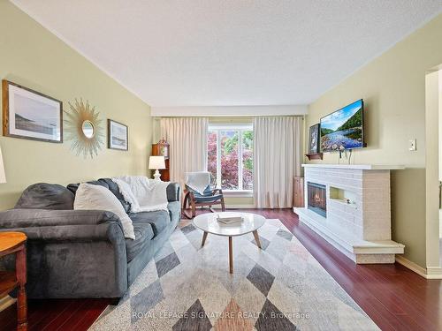 48 Oakmeadow Blvd, Toronto, ON - Indoor Photo Showing Living Room With Fireplace