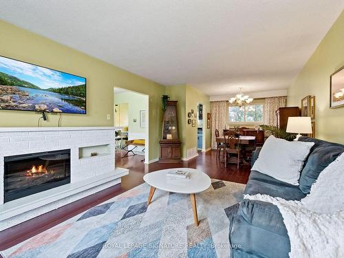 48 Oakmeadow Blvd, Toronto, ON - Indoor Photo Showing Living Room With Fireplace