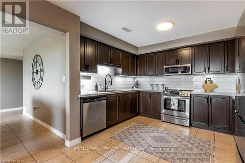 202 - 904 Paisley Road, Guelph, ON - Indoor Photo Showing Kitchen With Stainless Steel Kitchen