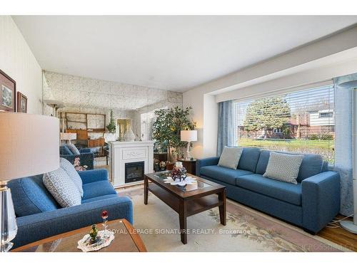 76 Ellington Dr, Toronto, ON - Indoor Photo Showing Living Room With Fireplace