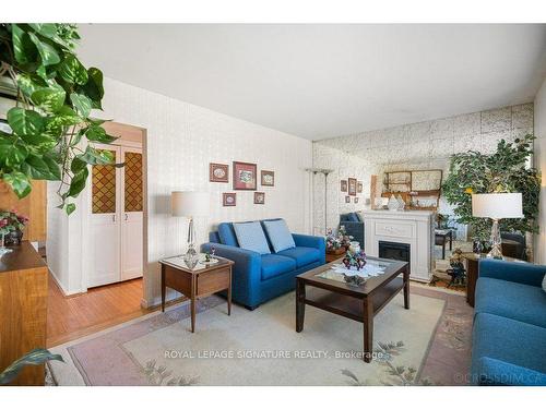 76 Ellington Dr, Toronto, ON - Indoor Photo Showing Living Room With Fireplace