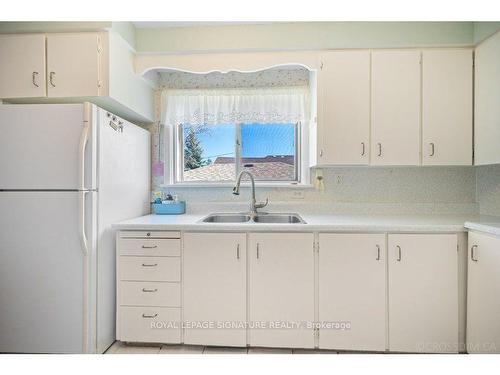 76 Ellington Dr, Toronto, ON - Indoor Photo Showing Kitchen With Double Sink