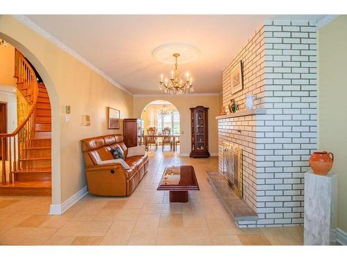 Family room - 3055 Rue St-Victor, Laval (Duvernay), QC - Indoor Photo Showing Other Room With Fireplace