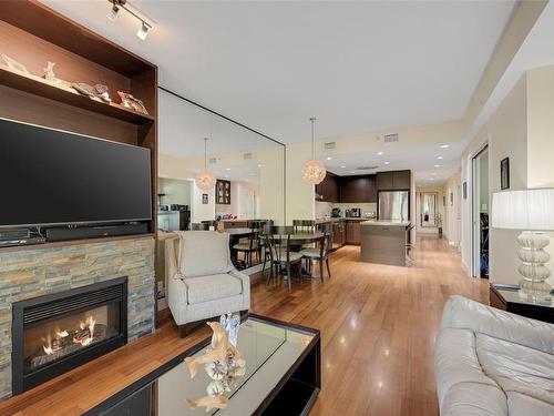 101-1400 Lynburne Pl, Langford, BC - Indoor Photo Showing Living Room With Fireplace