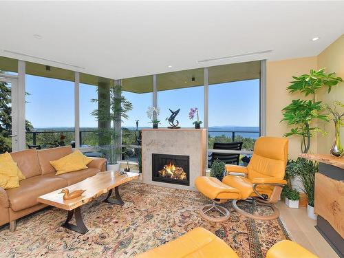 403-5388 Hill Rise Terr, Saanich, BC - Indoor Photo Showing Living Room With Fireplace