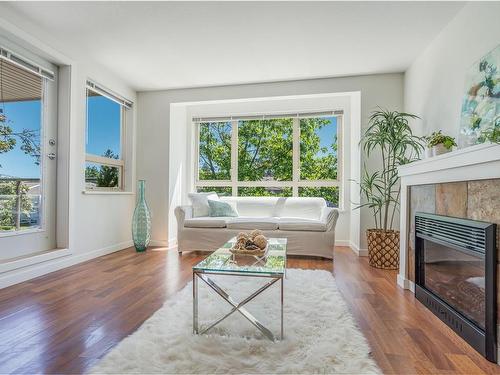 304-297 Hirst Ave, Parksville, BC - Indoor Photo Showing Living Room With Fireplace