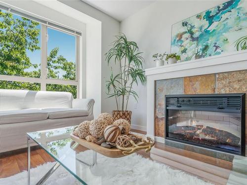 304-297 Hirst Ave, Parksville, BC - Indoor Photo Showing Living Room With Fireplace