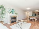 304-297 Hirst Ave, Parksville, BC  - Indoor Photo Showing Living Room With Fireplace 