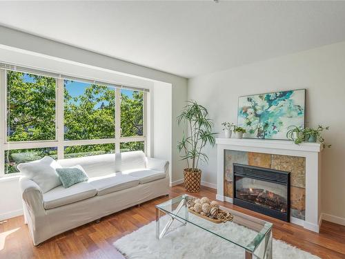 304-297 Hirst Ave, Parksville, BC - Indoor Photo Showing Living Room With Fireplace