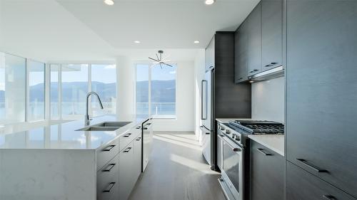 2105-1181 Sunset Drive, Kelowna, BC - Indoor Photo Showing Kitchen With Stainless Steel Kitchen With Double Sink With Upgraded Kitchen