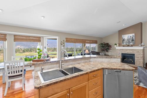 229-2455 Quail Ridge Boulevard, Kelowna, BC - Indoor Photo Showing Kitchen With Fireplace With Double Sink