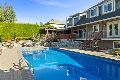 3374 Larkspur Court, Kelowna, BC - Outdoor With In Ground Pool With Deck Patio Veranda