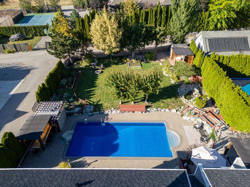 3374 Larkspur Court, Kelowna, BC - Outdoor With In Ground Pool With Deck Patio Veranda With Backyard