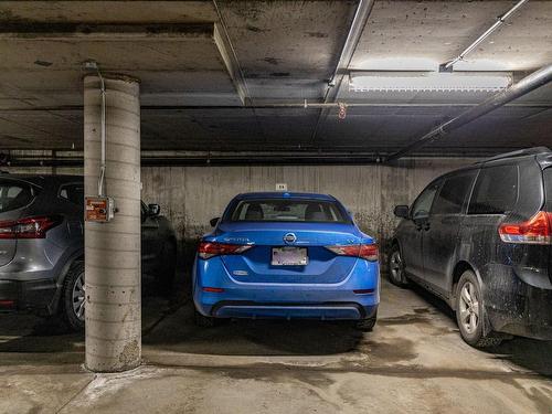 Garage - 803-65 Boul. René-Lévesque E., Montréal (Ville-Marie), QC - Indoor Photo Showing Garage