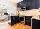 Kitchen - 5462 Av. Isabella, Montréal (Côte-Des-Neiges/Notre-Dame-De-Grâce), QC  - Indoor Photo Showing Kitchen With Upgraded Kitchen 