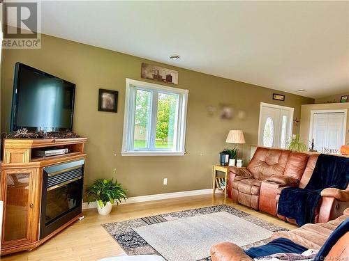 1002 Ch Martin, Sainte-Anne-De-Madawaska, NB - Indoor Photo Showing Living Room With Fireplace