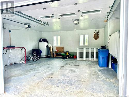 1002 Ch Martin, Sainte-Anne-De-Madawaska, NB - Indoor Photo Showing Garage