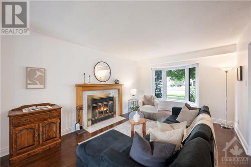 1045 Karsh Drive, Ottawa, ON - Indoor Photo Showing Living Room With Fireplace