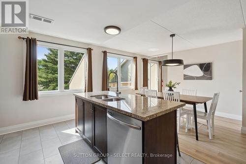 208 - 107 Wintergreen Place, Blue Mountains (Blue Mountain Resort Area), ON - Indoor Photo Showing Kitchen With Double Sink