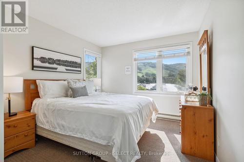 3rd floor second bedroom (Queen bed) - 208 - 107 Wintergreen Place, Blue Mountains (Blue Mountain Resort Area), ON - Indoor Photo Showing Bedroom