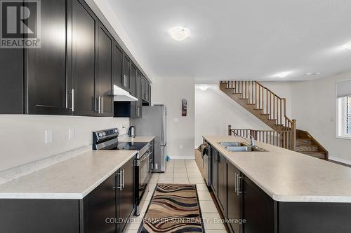 42 Donald Ficht Crescent, Brampton, ON - Indoor Photo Showing Kitchen With Double Sink