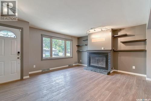 1196 Duffield Crescent, Moose Jaw, SK - Indoor Photo Showing Living Room With Fireplace