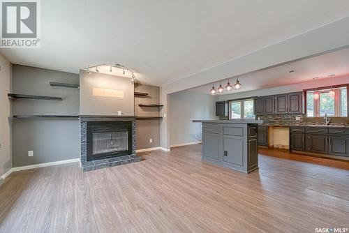 1196 Duffield Crescent, Moose Jaw, SK - Indoor Photo Showing Living Room With Fireplace