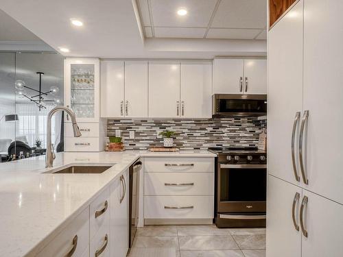 Cuisine - 1203-15 Rue Des Émeraudes, Repentigny (Repentigny), QC - Indoor Photo Showing Kitchen With Upgraded Kitchen